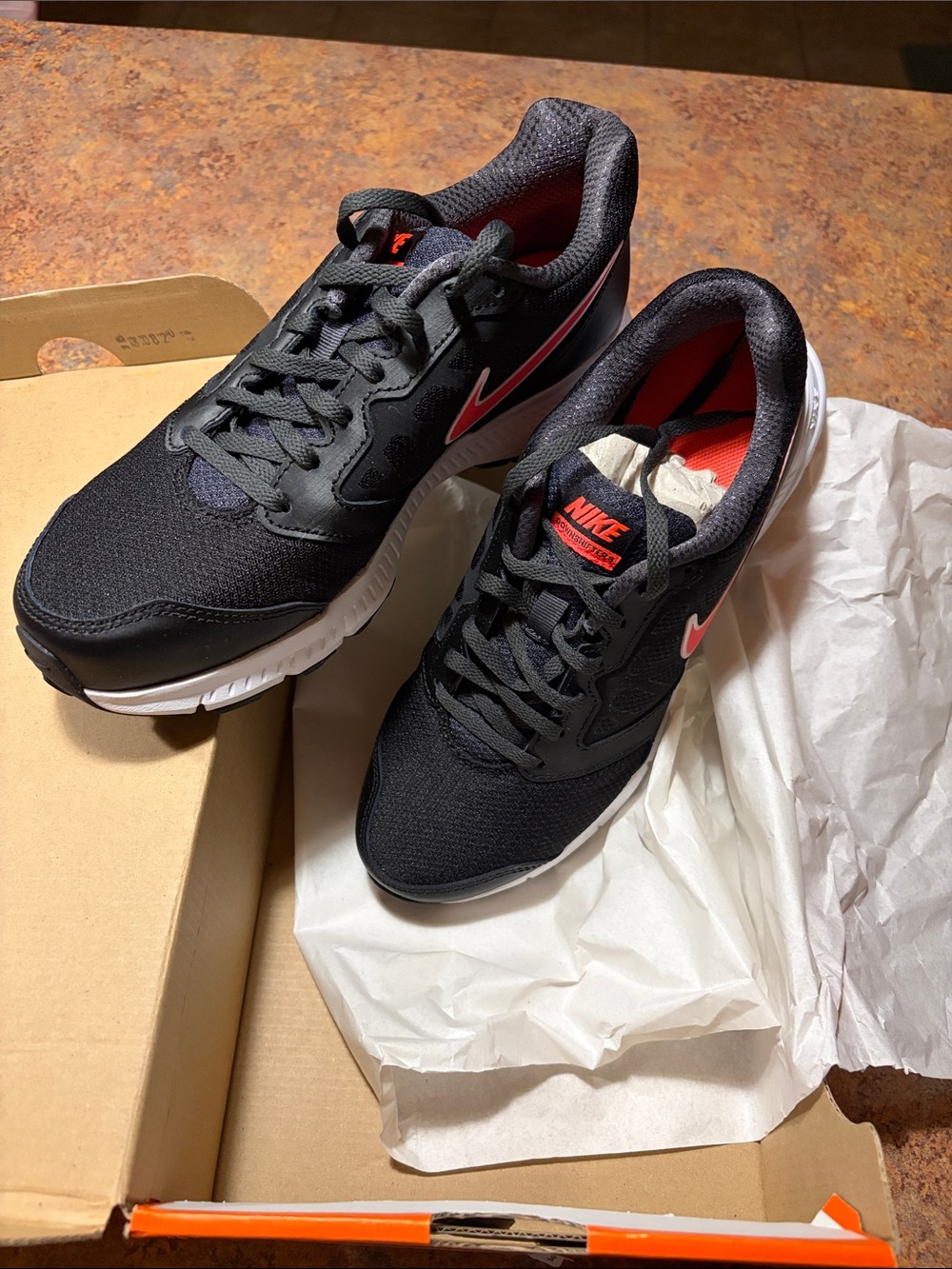 Nike Black Sneakers with Pink Swoosh and White Sole